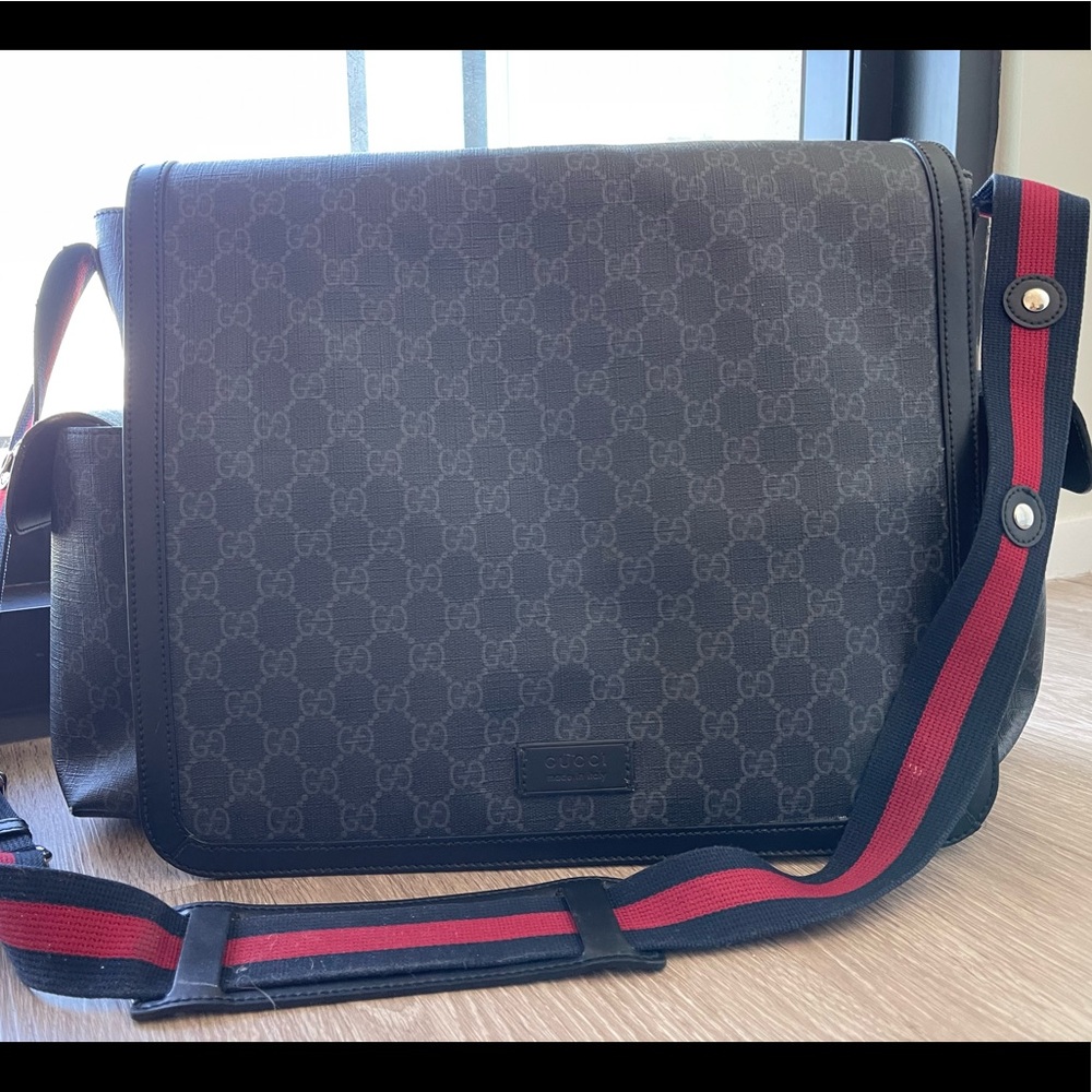 I am selling a Gucci x Supreme Diaper Bag